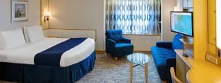С окном Ultra Spacious Ocean View Stateroom (1K)